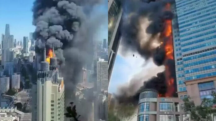 Gran incendio consume edificio de oficinas en Tianjin, China