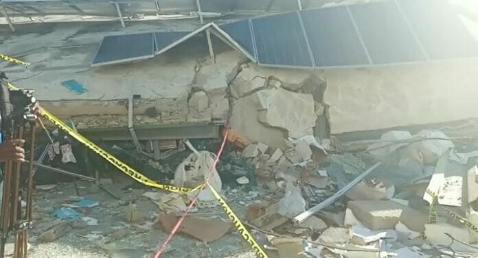 Joven embarazada permanece bajo escombros de edificio colapsado en La Vega