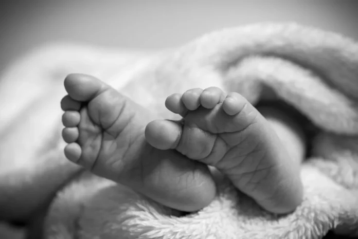 Fallece niño de 7 meses en Puerto Plata por asfixiarse con tapa de refresco