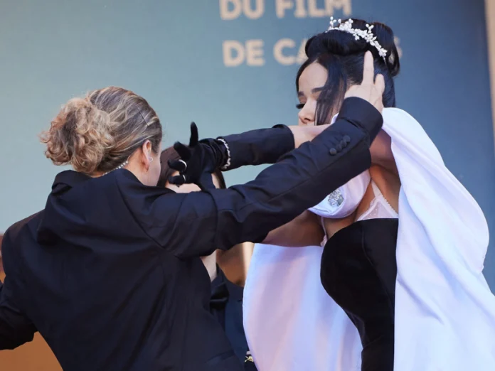 Massiel Taveras es sacada a fuerza de la alfombra roja de Cannes tras lucir su largo vestido
